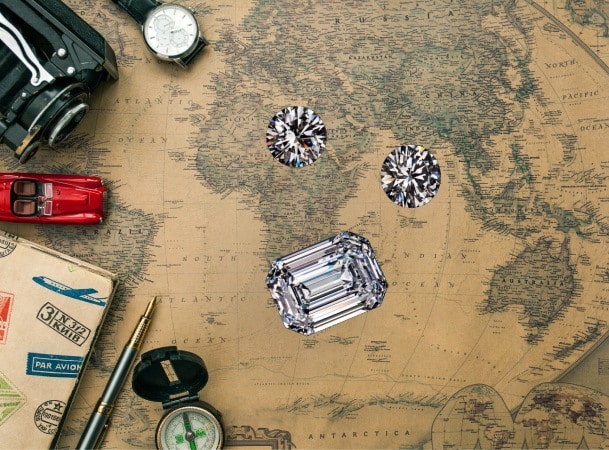 Three Polished Diamonds Over a Map