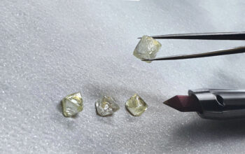 Four Unpolished Diamonds Being Assessed For Quality