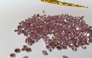 Loose Uncut Pink and Yellow Fancy Diamonds